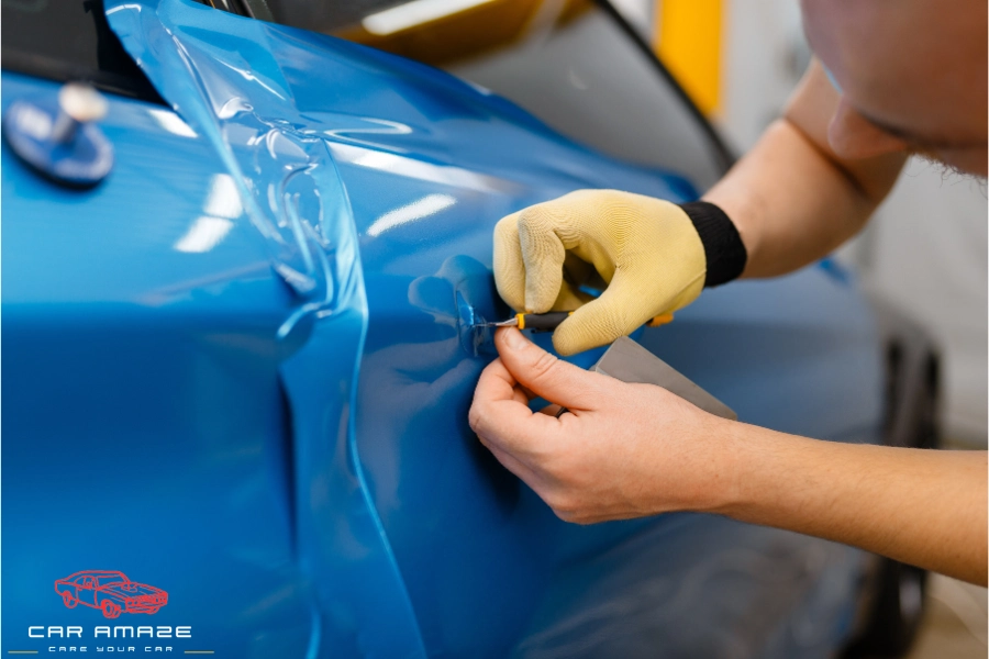 Installation of camouflage car vinyl wrap